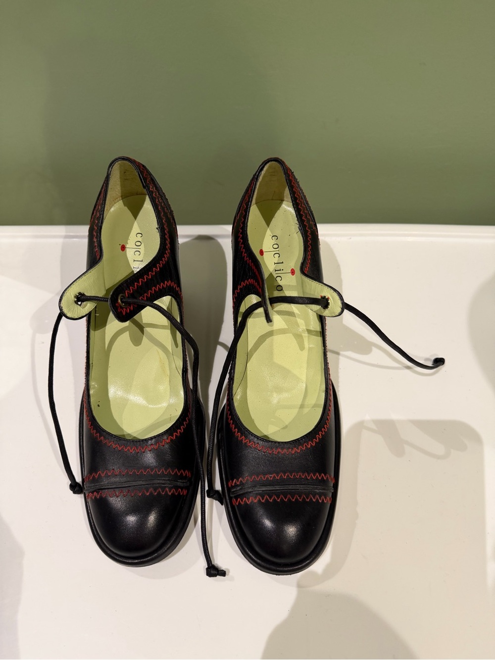 COCLICO Black Leather Mary Jane heels with Red Stitching